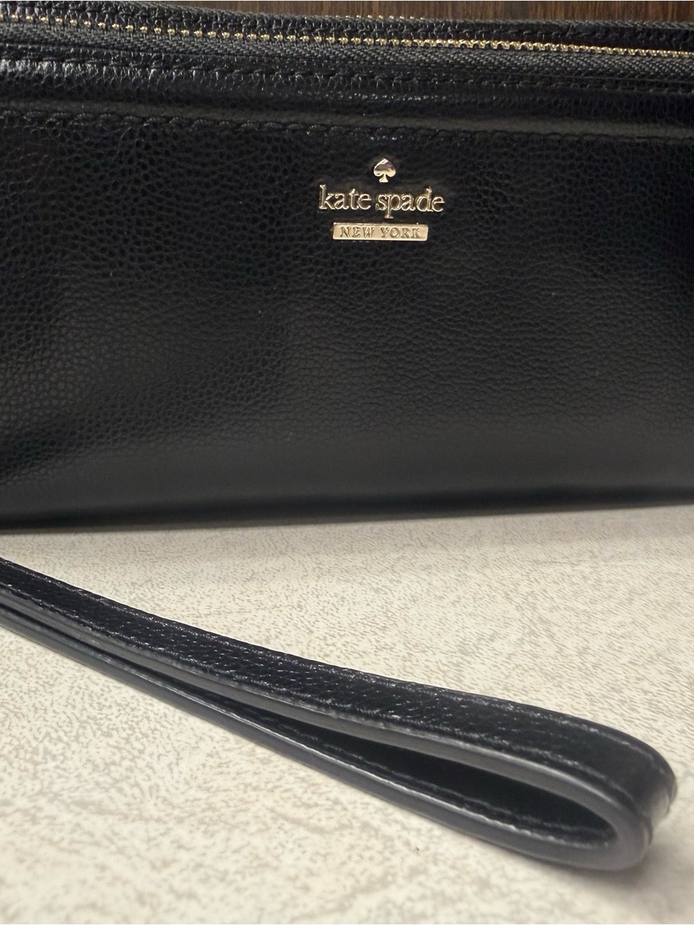 kate spade Black Leather Wristlet Clutch with Gold Logo